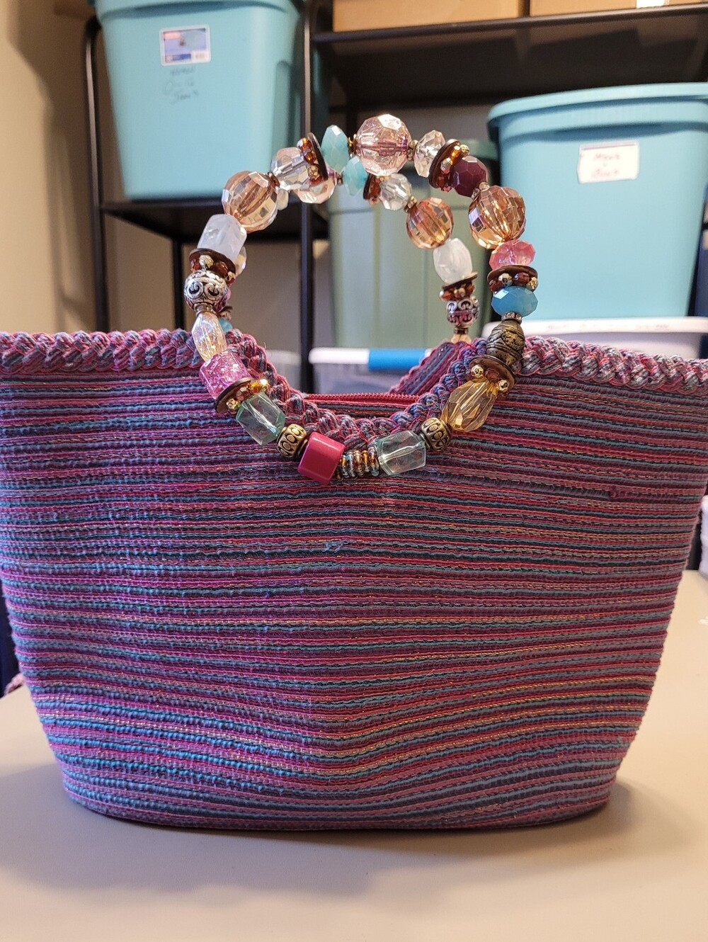 Cappelli Straworld Inc. Beaded Handle Pink & Purple Woven Tote Bag.